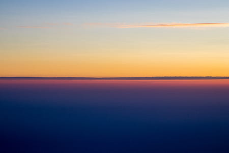 landscape photo of horizon during orange sunset thumbnail