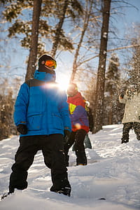 Man in Blue Full-zip Jacket on Snowy Field thumbnail