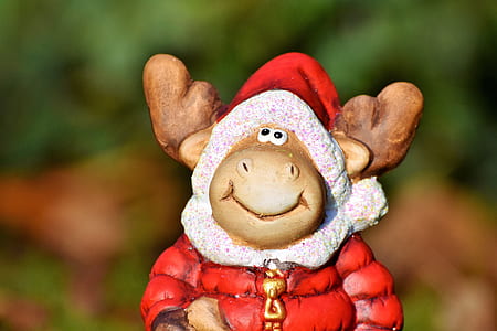 deer in red jacket figurine thumbnail