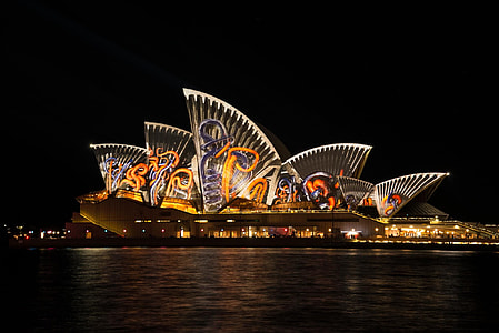 Sydney Opera House near body of water during night time thumbnail