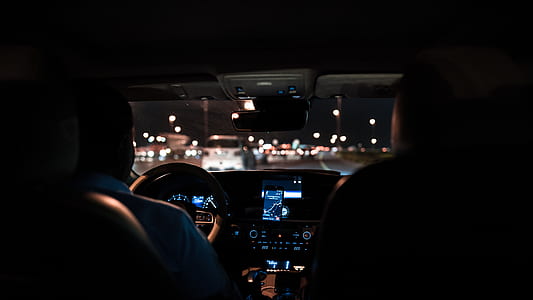 two person in front of vehicle sitting on seats thumbnail