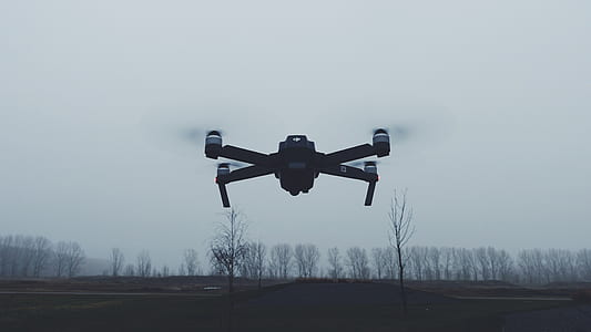 quadcopter drone in middle of air thumbnail