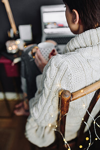 Woman drinking hot tea in her home office thumbnail