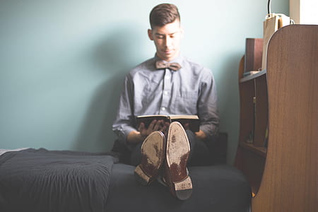 man reading a book thumbnail