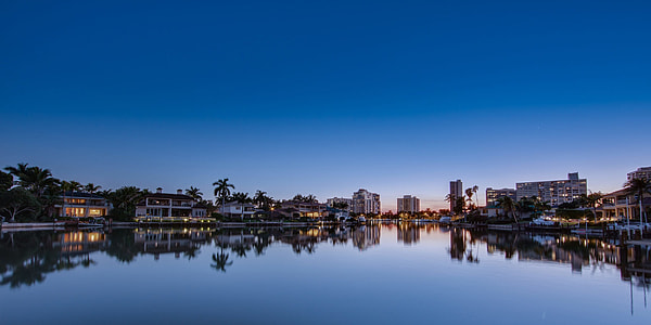 body of water surrounded by buildings thumbnail