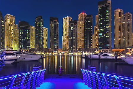 city building with lights during night time thumbnail