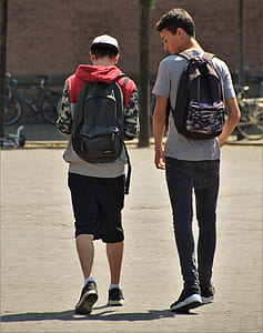two boy walking on the street thumbnail