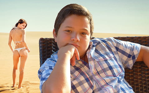 boy sitting on patio chair thumbnail