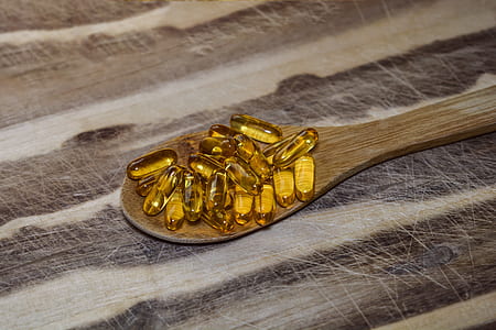 selective focus photography of spoonful of jell capsules thumbnail