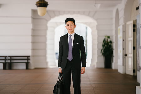 Men Wearing Black Suit Jacket and Pants thumbnail