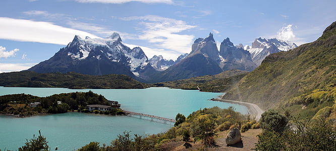 aerial photography of mountain near body of water thumbnail