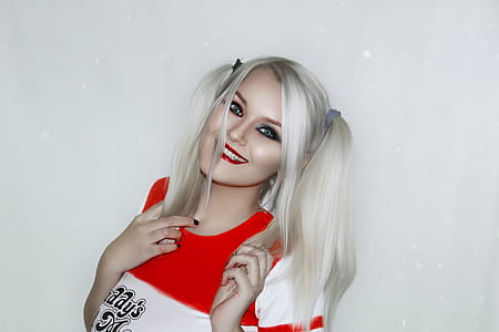woman smiling wearing Harley Quinn costume thumbnail