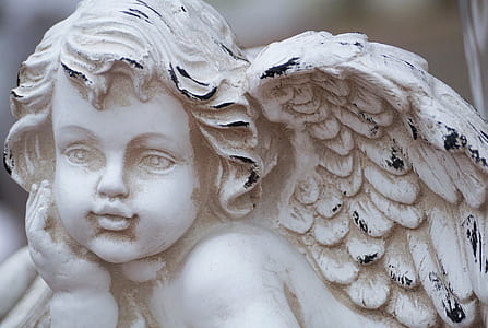 cherub statue close-up photo thumbnail