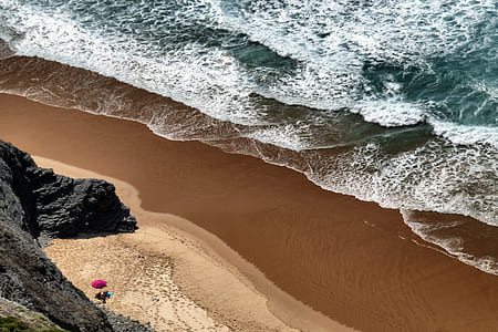 aerial photography of body of water near shore thumbnail
