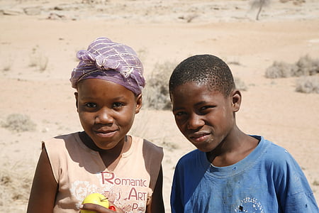 selective focus photography of girl and boy beside each other thumbnail