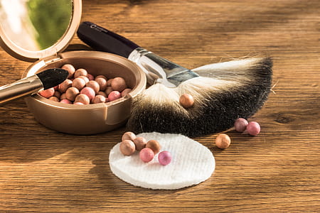 makeup beads and makeup brush closeup photo thumbnail