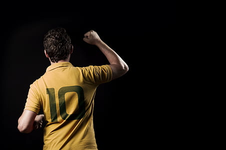 man wearing yellow 10 jersey polo shirt thumbnail