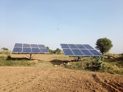 16 solar panels on field at daytime thumbnail