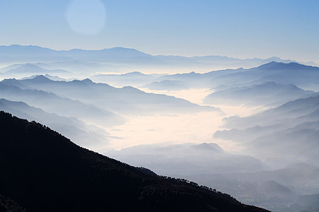 Great landscape with mountains and mist thumbnail
