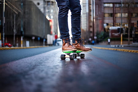person riding plastic board on streets thumbnail