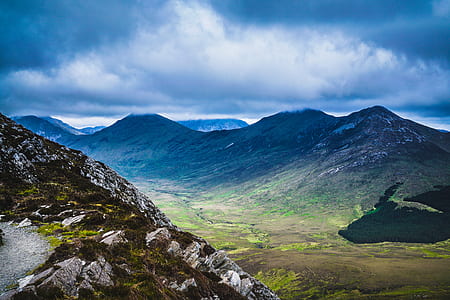 photo of green grass surrounded mountain thumbnail