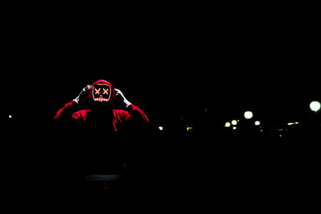 person wearing double x mask thumbnail