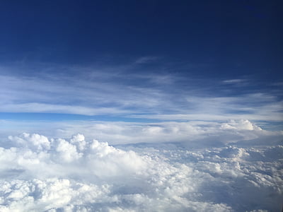 cumulus clouds under blue sky thumbnail