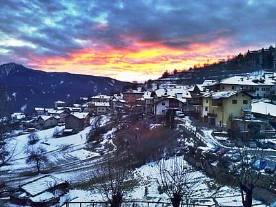 Snow Village Under Golden Hour thumbnail