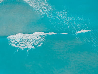 aerial photography of blue body of water thumbnail