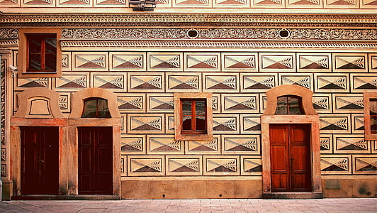 closed brown wooden door during daytime thumbnail