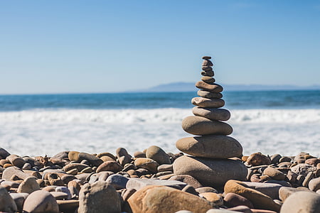 shallow focus photo of stacked stones thumbnail