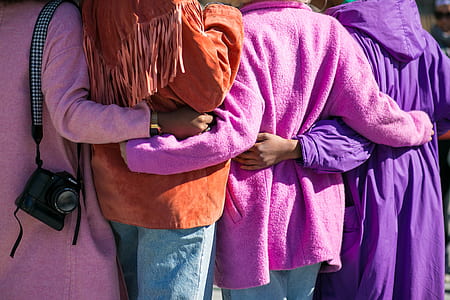 four people hugging each other thumbnail