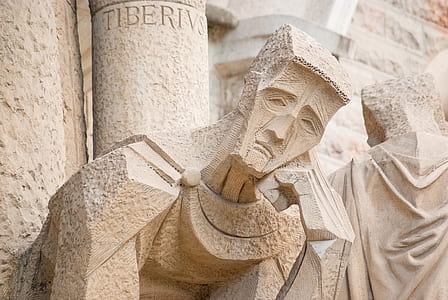 stone sculpture of man thumbnail