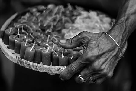 person holding candle lot thumbnail