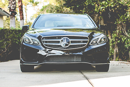 black Mercedes-Benz class parked during daytime thumbnail