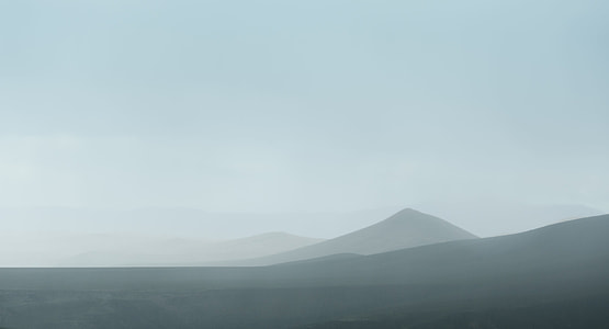 photo of mountains during day time thumbnail