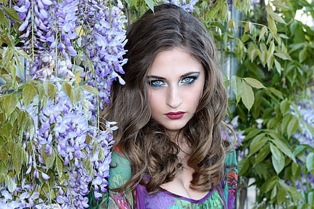 woman wearing purple and green scoop-neck top thumbnail