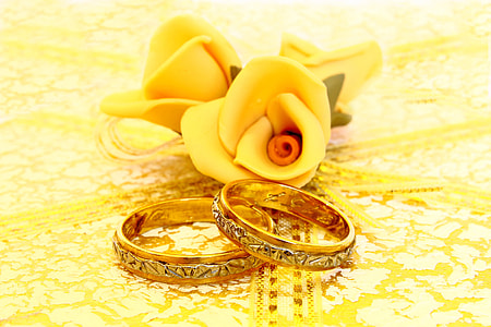 pair of gold-colored wedding ring set thumbnail