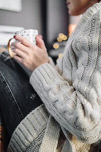 Woman drinking hot tea in her home office thumbnail