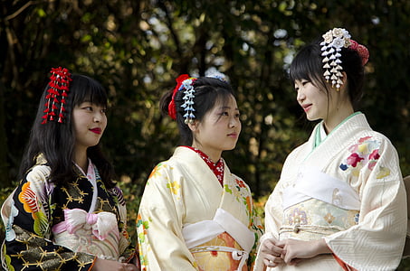 three black haired woman wearing kimono thumbnail