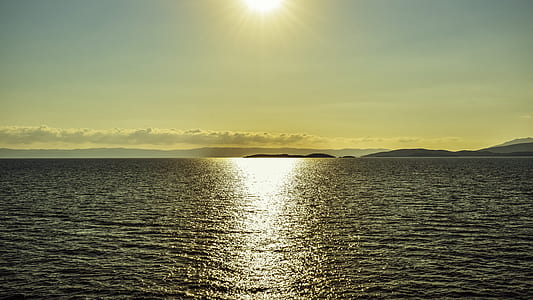 body of water during daytime photography thumbnail
