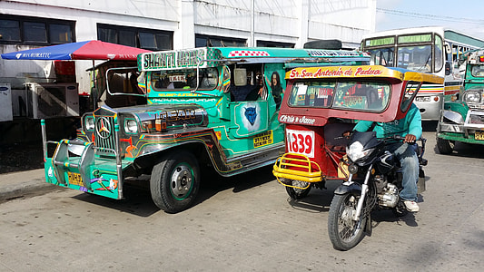 jeepney and tricycle at the street thumbnail