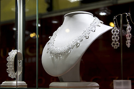 women's clear necklace on display thumbnail