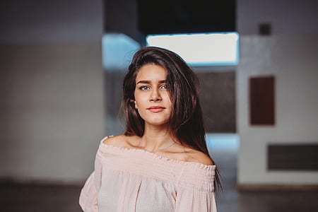 woman wearing pink off-shoulder top thumbnail