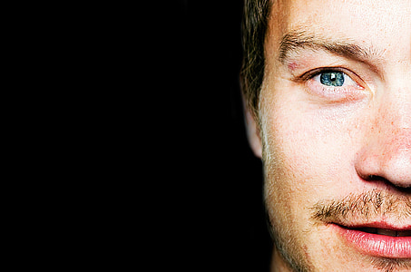 half portrait photography of man's face thumbnail