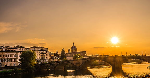 brown concrete bridge at sunset thumbnail
