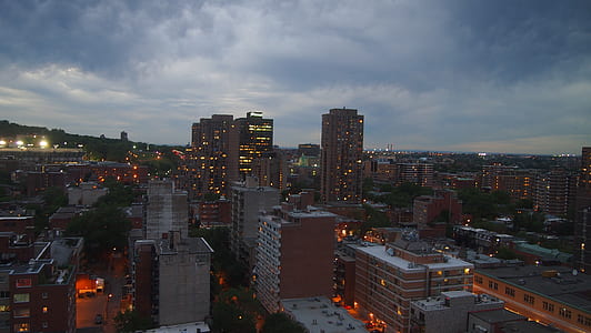 city buildings with lights during daytime thumbnail