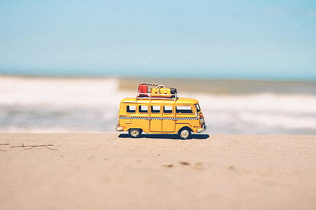 yellow bus scale model on surface thumbnail