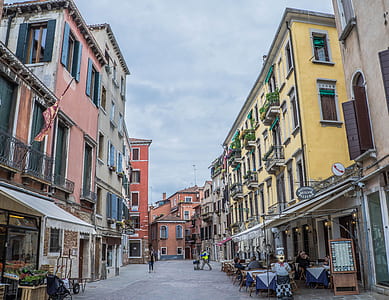 yellow and red concrete buildings thumbnail