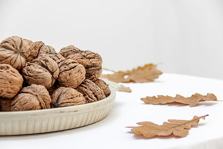 walnuts on white plate thumbnail